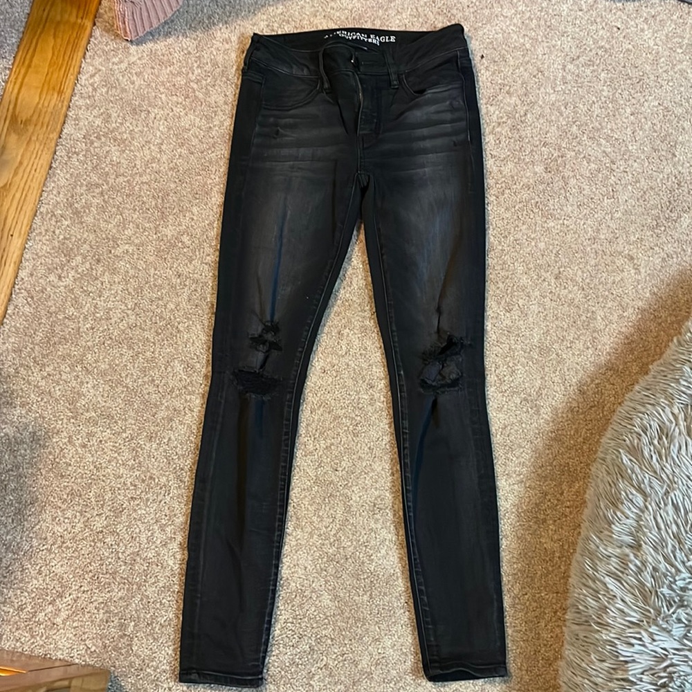 Distressed, black skinny jeggings. Size 4R